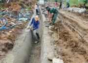 Satgas TMMD ke-127 Kodim 0207/Simalungun Bersama Warga Kebut Pembangunan Drainase di Bahapal