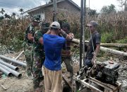 Semangat Tanpa Batas di Bulan Ramadan, Satgas TMMD ke-127 Bersama Warga Bangun Sumur Bor di Nagori Bahapal