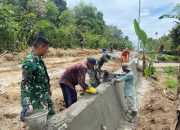 Aksi Nyata di Nagori Bahapal, Satgas TMMD Ke-127 Perkuat Bahu Jalan, Cegah Longsor
