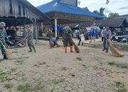 Hangatnya Kebersamaan di Pekan Merek Raya, Satgas TMMD Ke 127 dan Warga Gotong Royong Bersihkan Fasilitas Umum