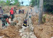 Semangat Tak Surut, Satgas TMMD Ke-127 Lanjutkan Pembuatan Drainase di Nagori Bahapal