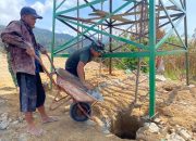 Satgas TMMD ke-127 Laksanakan Pengecoran Kaki Menara Tandon Air di Nagori Bahapal