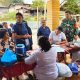 Hangatnya Kebersamaan di Posyandu, Babinsa Koramil 09/Tiga Balata Turun Langsung Dampingi Warga